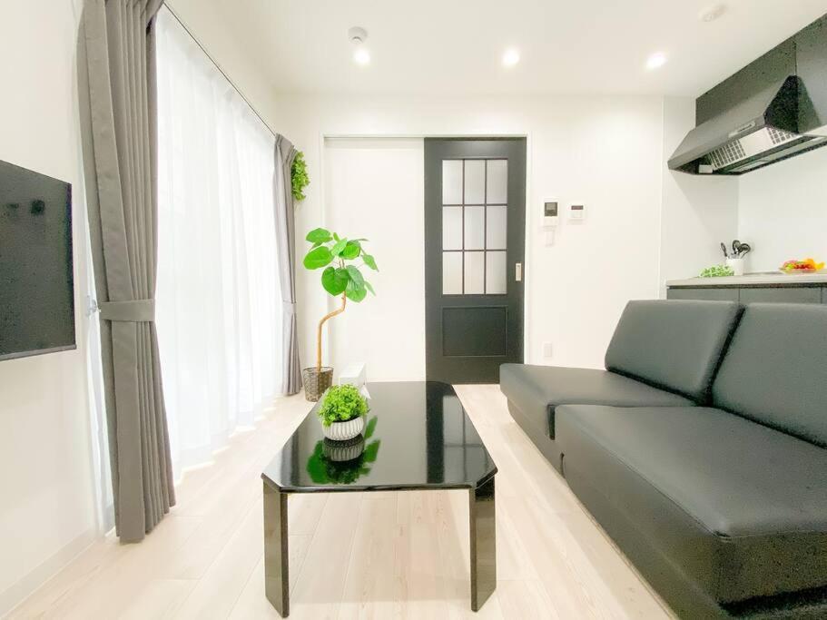 Residential Hotel Glitter Usjまで1駅5分 Osaka Room photo