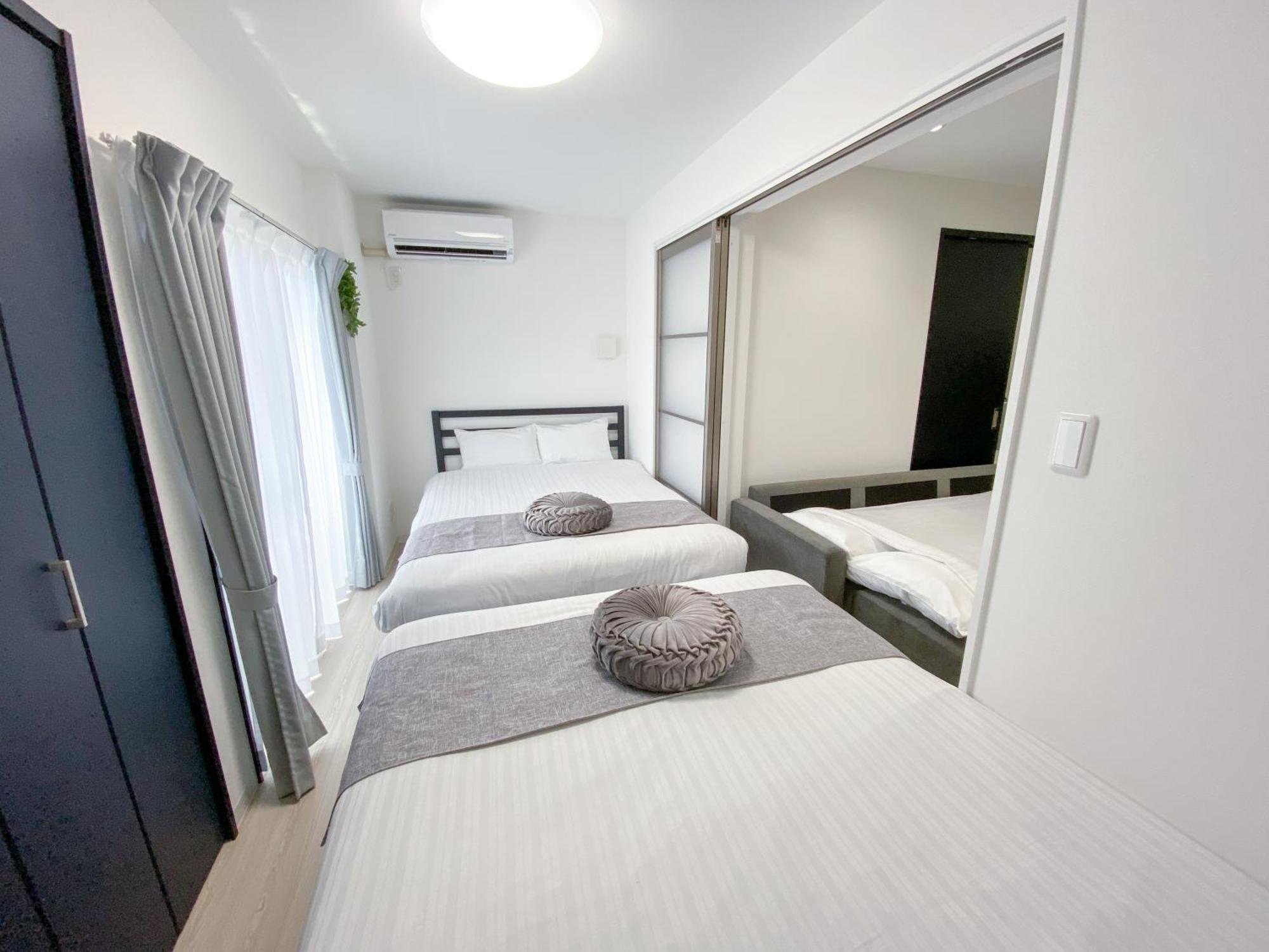 Residential Hotel Glitter Usjまで1駅5分 Osaka Room photo